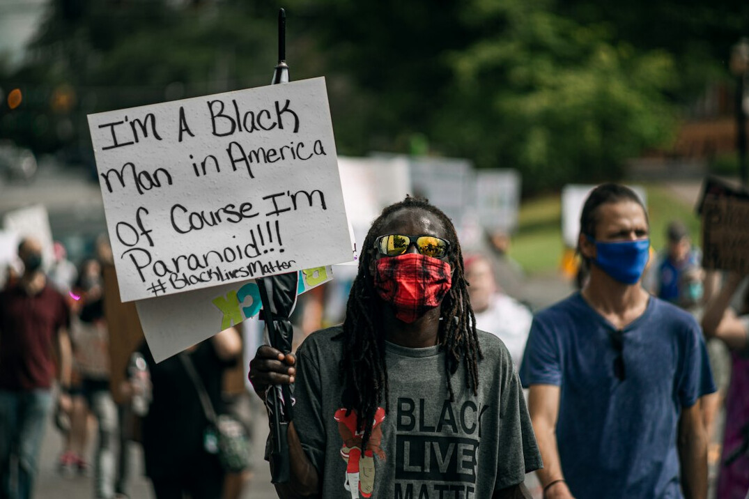 people protesting in street
